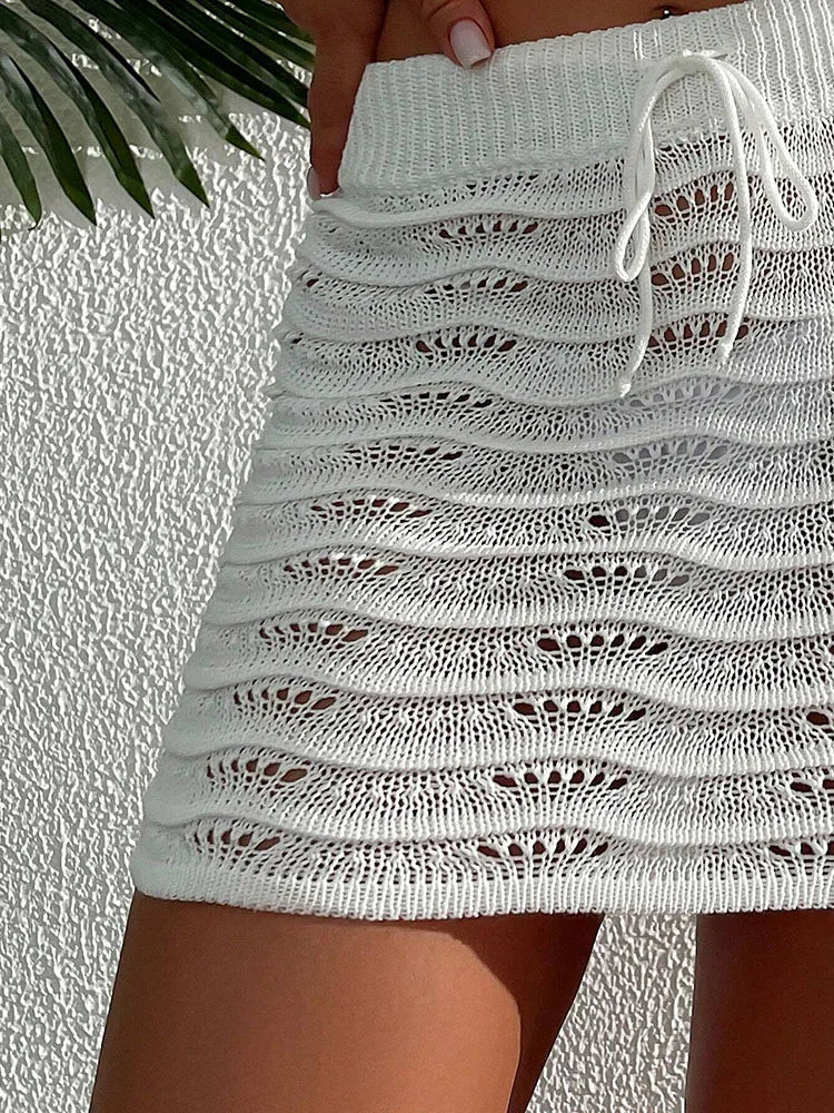 Moda praia saia crochê elegante cor sólida saia curta de malha bloqueada